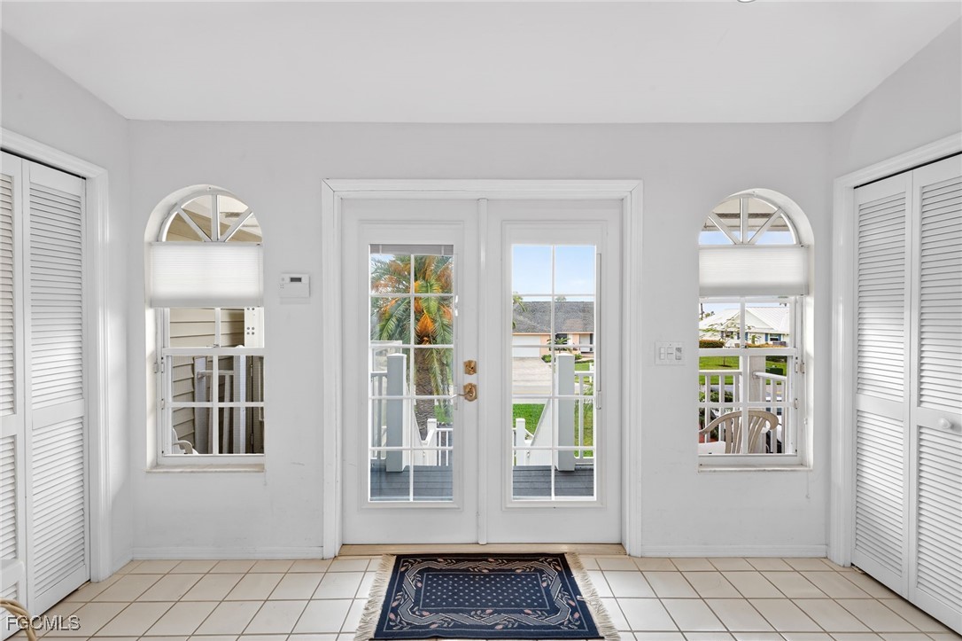 966 Sand Castle Road Sanibel, FL 33957 - Photo 4 of 39 a view of front door with wooden floor
