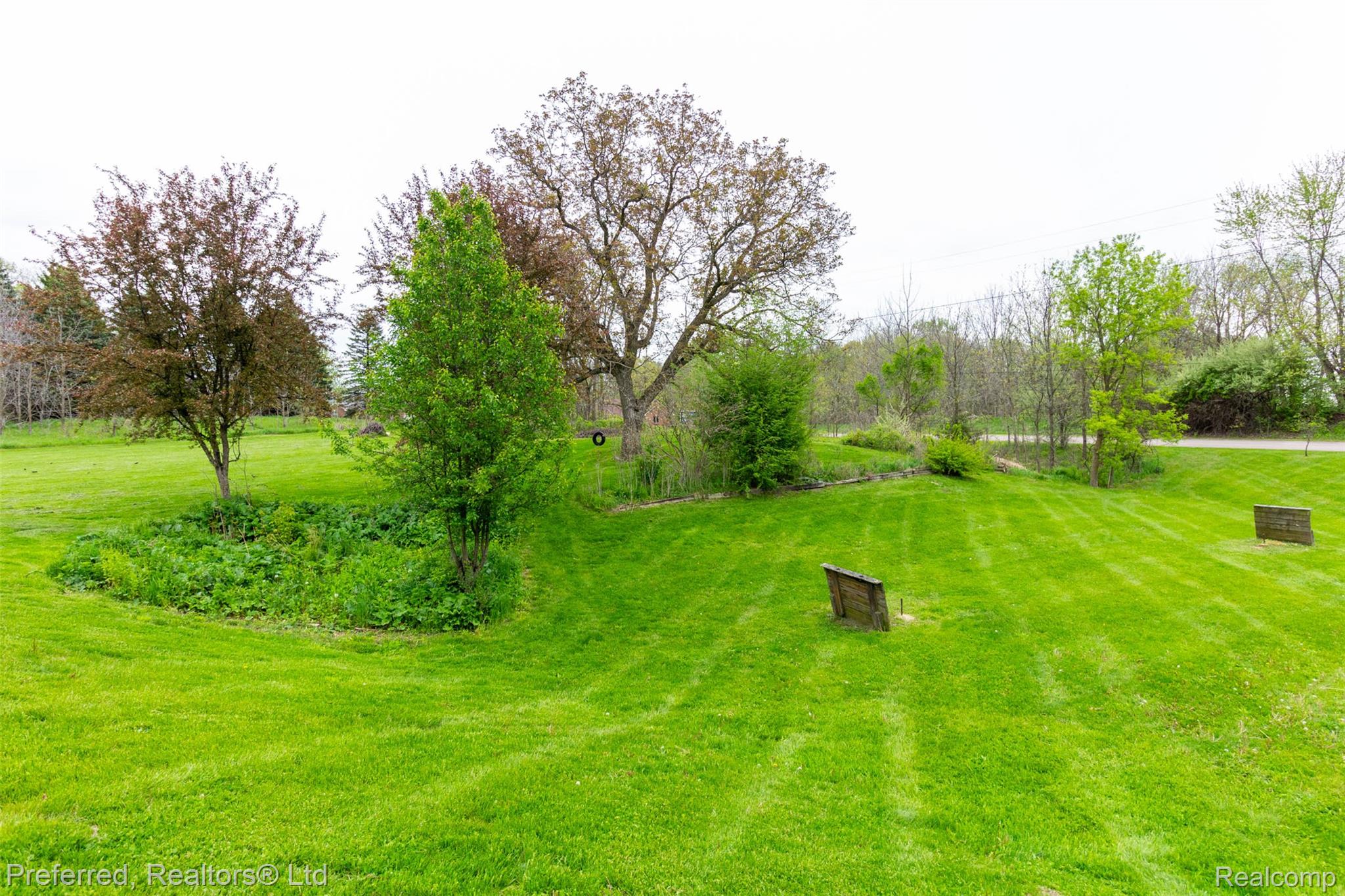 9840 Currie Road Northville, MI 48167 - Photo 45 of 62 View of green lawn