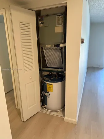 a view of storage and utility room