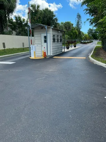 a view of a house with a street