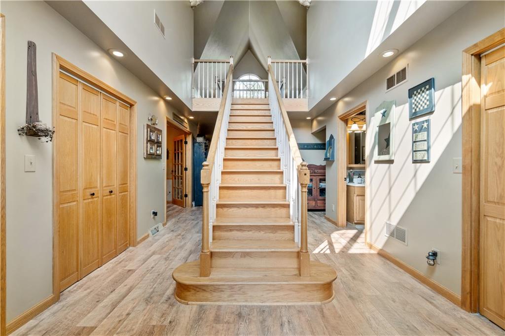135 A Mowry Road Monaca, PA 15061 - Photo 8 of 49 The entry features several storage closets and a beautiful staircase to the 2nd floor.
