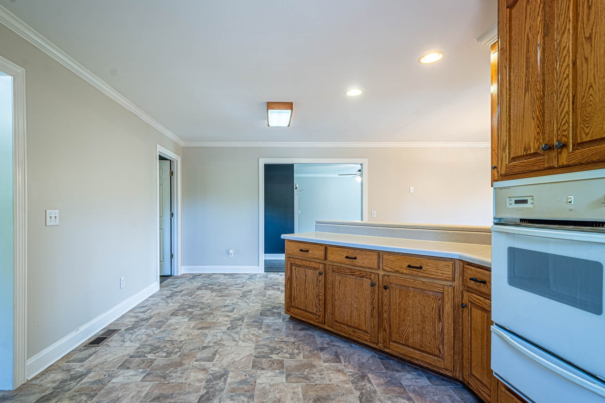 1316 Powdermill Hill Road Lawrenceburg, TN 38464 - Photo 24 of 70 a view of a kitchen with sink and dishwasher wooden floor
