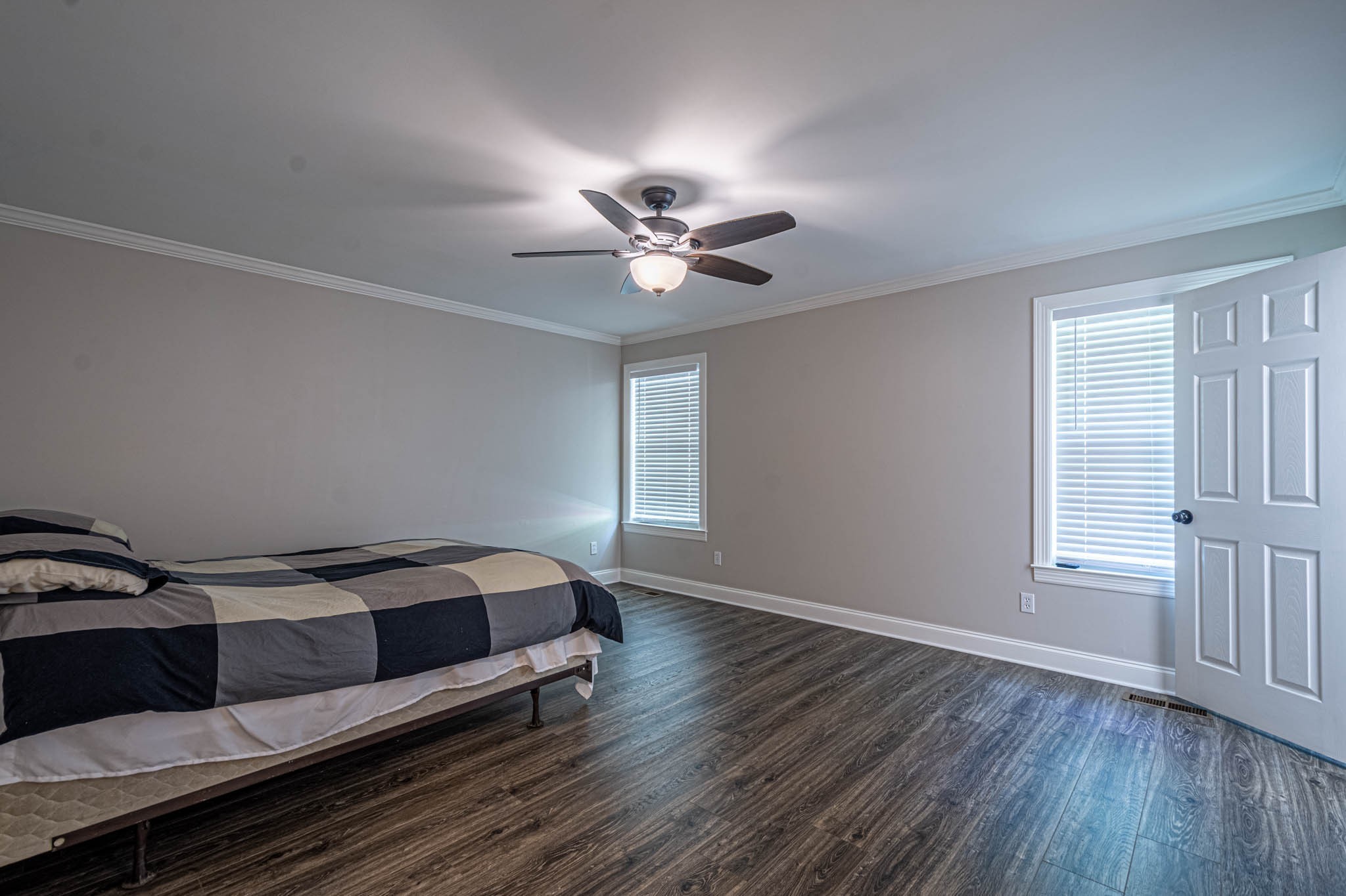 1316 Powdermill Hill Road Lawrenceburg, TN 38464 - Photo 28 of 70 a bedroom with a bed and a ceiling fan