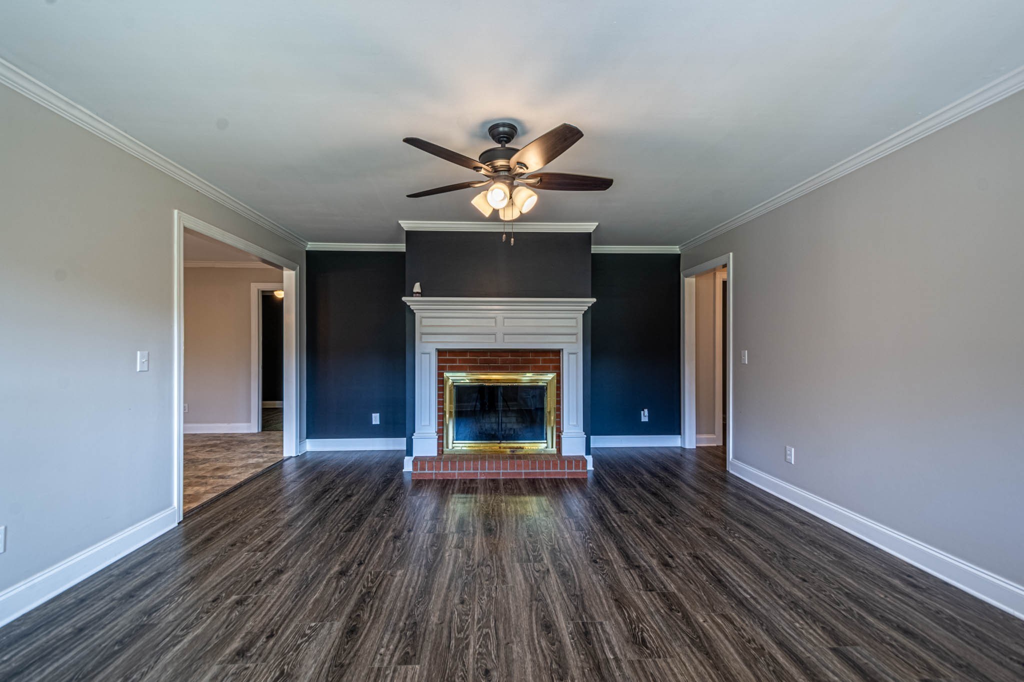 1316 Powdermill Hill Road Lawrenceburg, TN 38464 - Photo 3 of 70 a living room with furniture and a fireplace