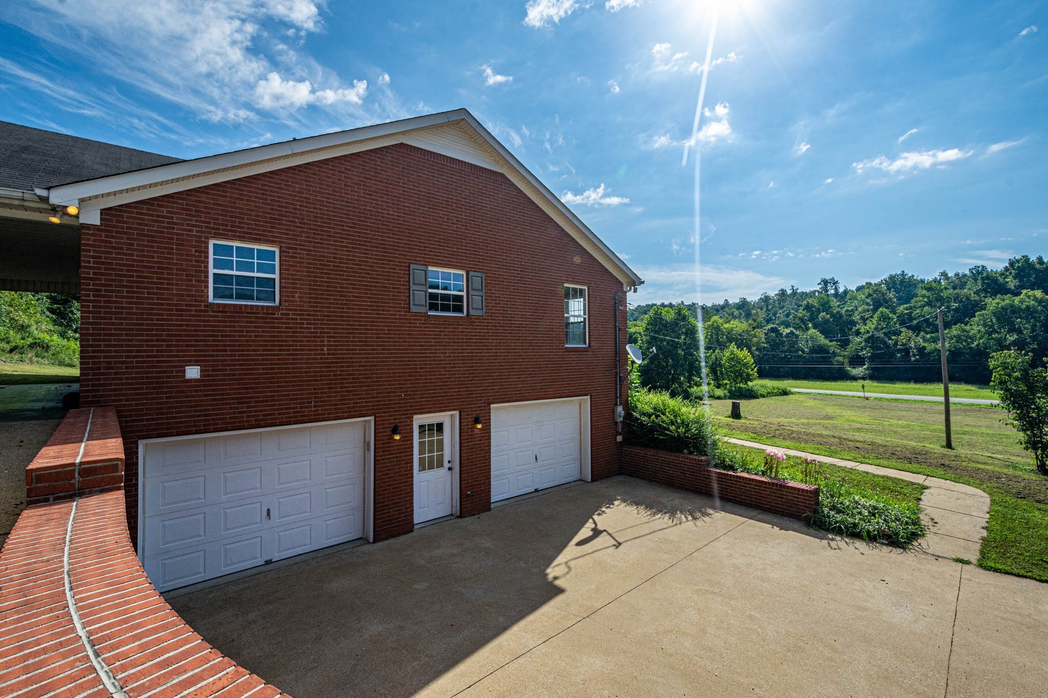 1316 Powdermill Hill Road Lawrenceburg, TN 38464 - Photo 56 of 70 a view of backyard with a garden and plants