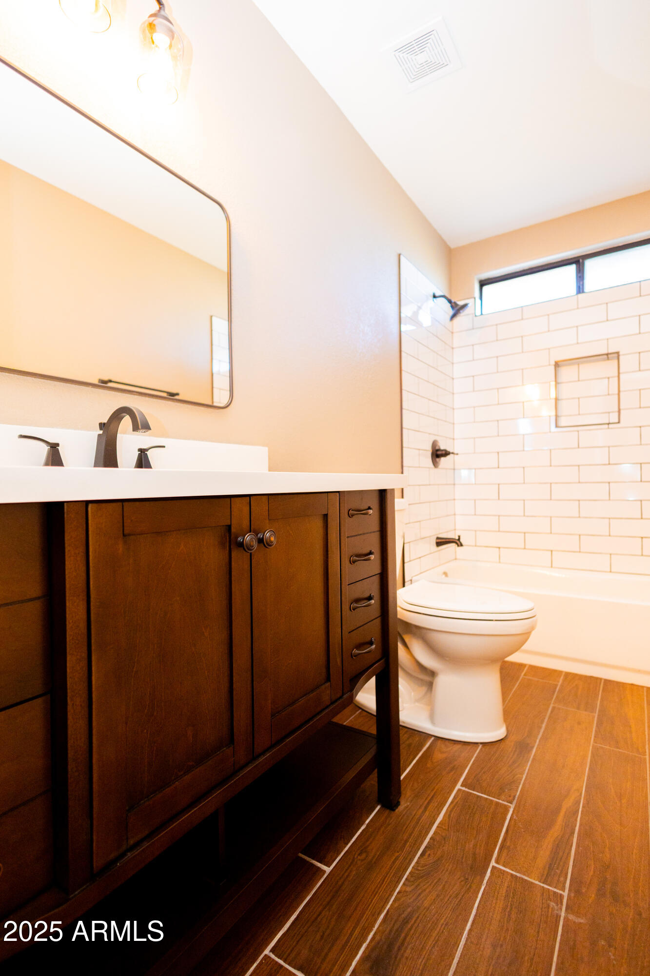 5837 South Wild Rose Road Hereford, AZ 85615 - Photo 22 of 46 a bathroom with a sink a toilet and shower