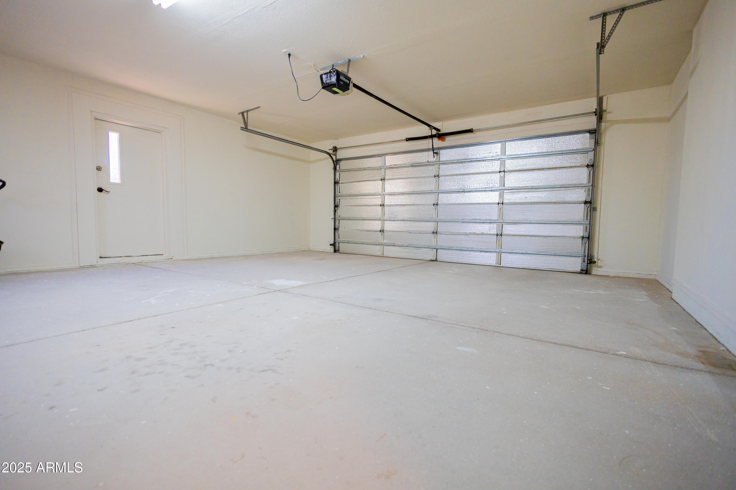 5837 South Wild Rose Road Hereford, AZ 85615 - Photo 45 of 46 a view of an empty room with a white walls