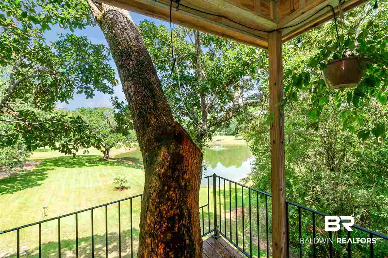 11000 Kelly Road Mobile, AL 36608 - Photo 36 of 48 View from tree house overlooking pond.