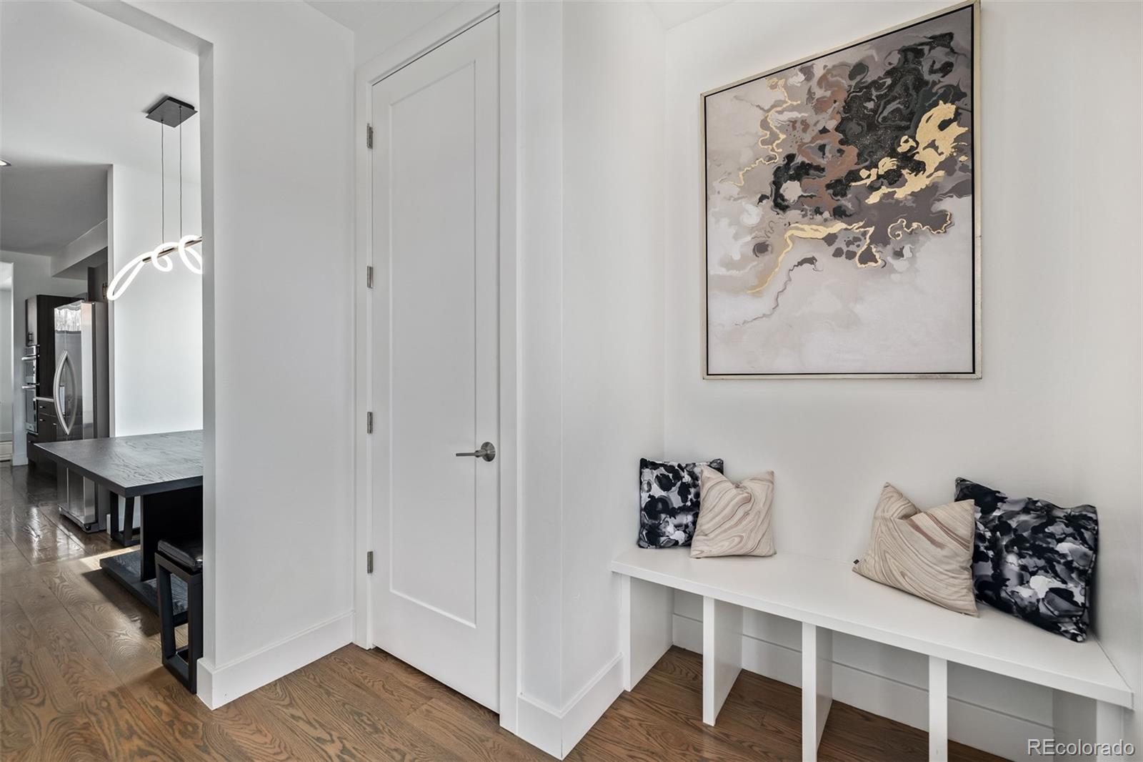 2245 Meade Street Denver, CO 80211 - Photo 13 of 40 a bedroom with a bed and a table in it