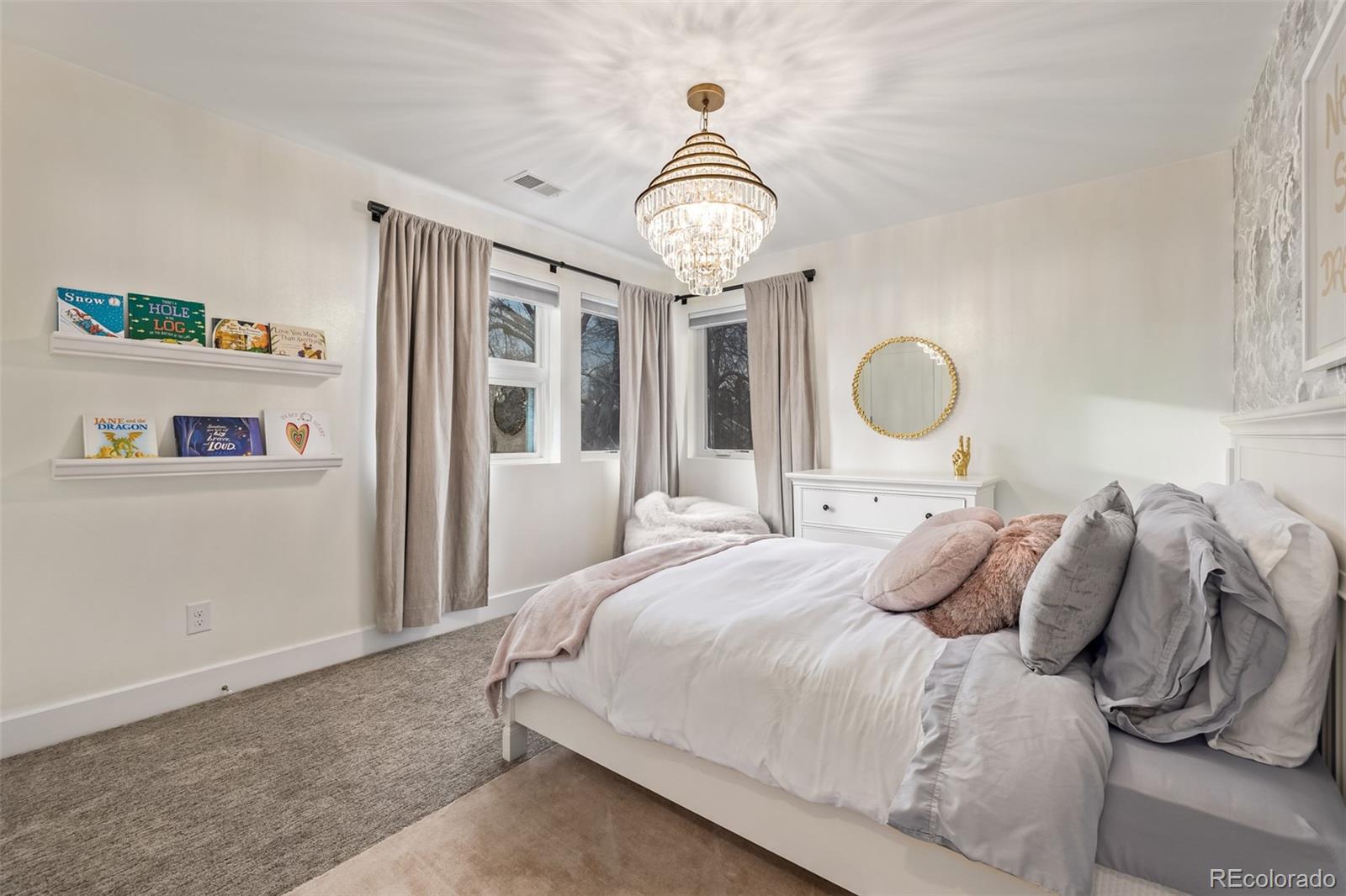 2245 Meade Street Denver, CO 80211 - Photo 23 of 40 a bedroom with a bed and a window