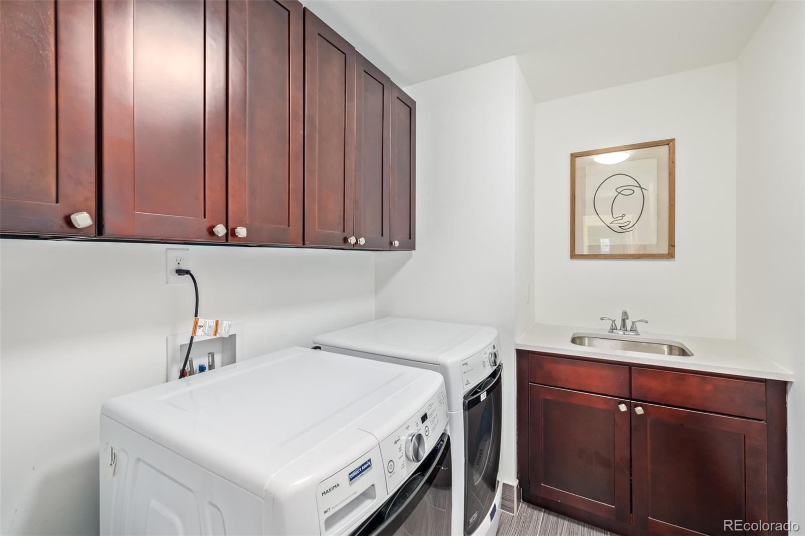 2245 Meade Street Denver, CO 80211 - Photo 28 of 40 a utility room with a sink