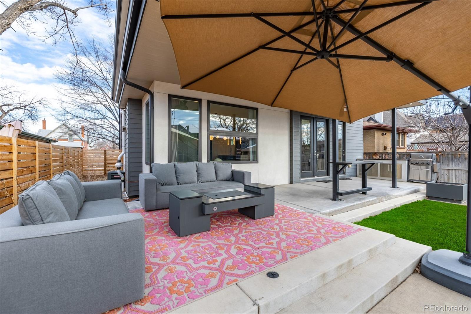 2245 Meade Street Denver, CO 80211 - Photo 34 of 40 a patio with couches and a fire pit
