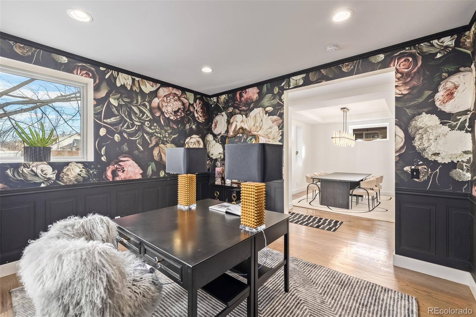 2245 Meade Street Denver, CO 80211 - Photo 5 of 40 a living room with furniture and wooden floor