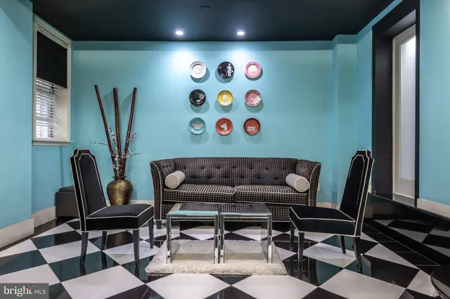 a room with gym equipment and a large window