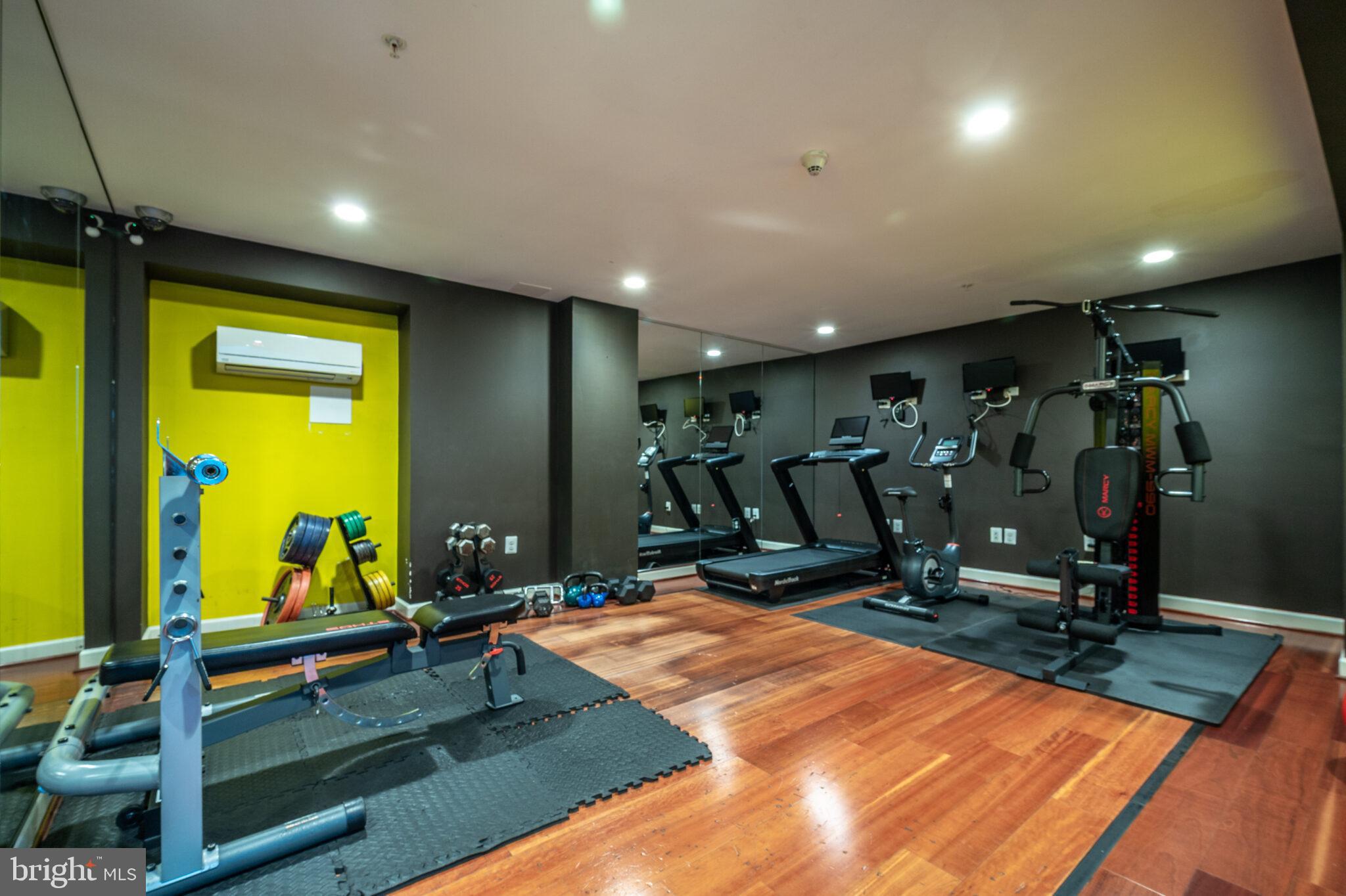 1314 Massachusetts Avenue Northwest, Unit 608 Washington, DC 20005 - Photo 26 of 40 a view of a room with gym equipment