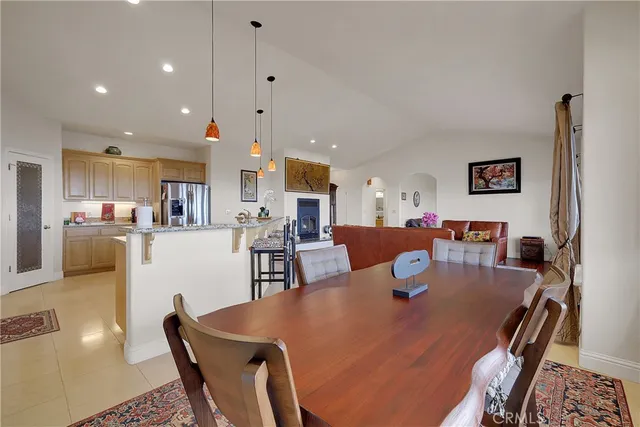 a bathroom with a sink double vanity granite and a mirror