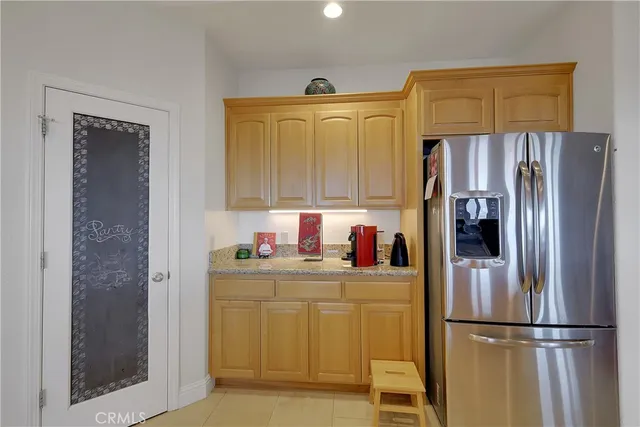 a view of a hallway with closet and wooden floor