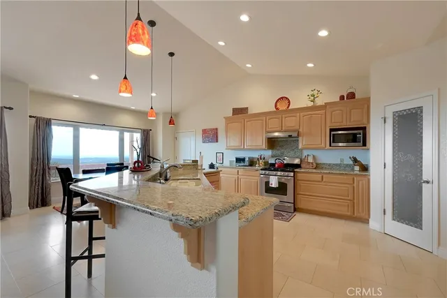 a view of balcony with wooden floor