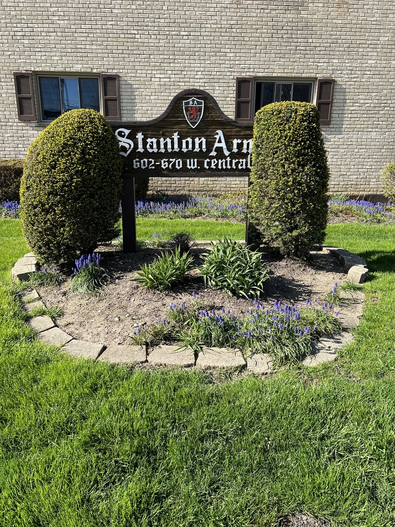 602 West Central Road Arlington Heights, IL 60005 - Photo 22 of 22 a front view of a house with garden