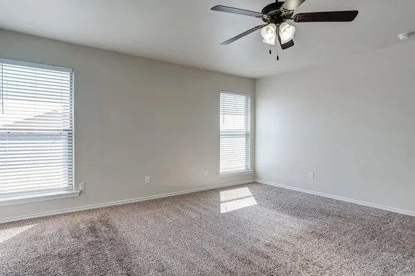 a kitchen with stainless steel appliances granite countertop wooden cabinets and a sink