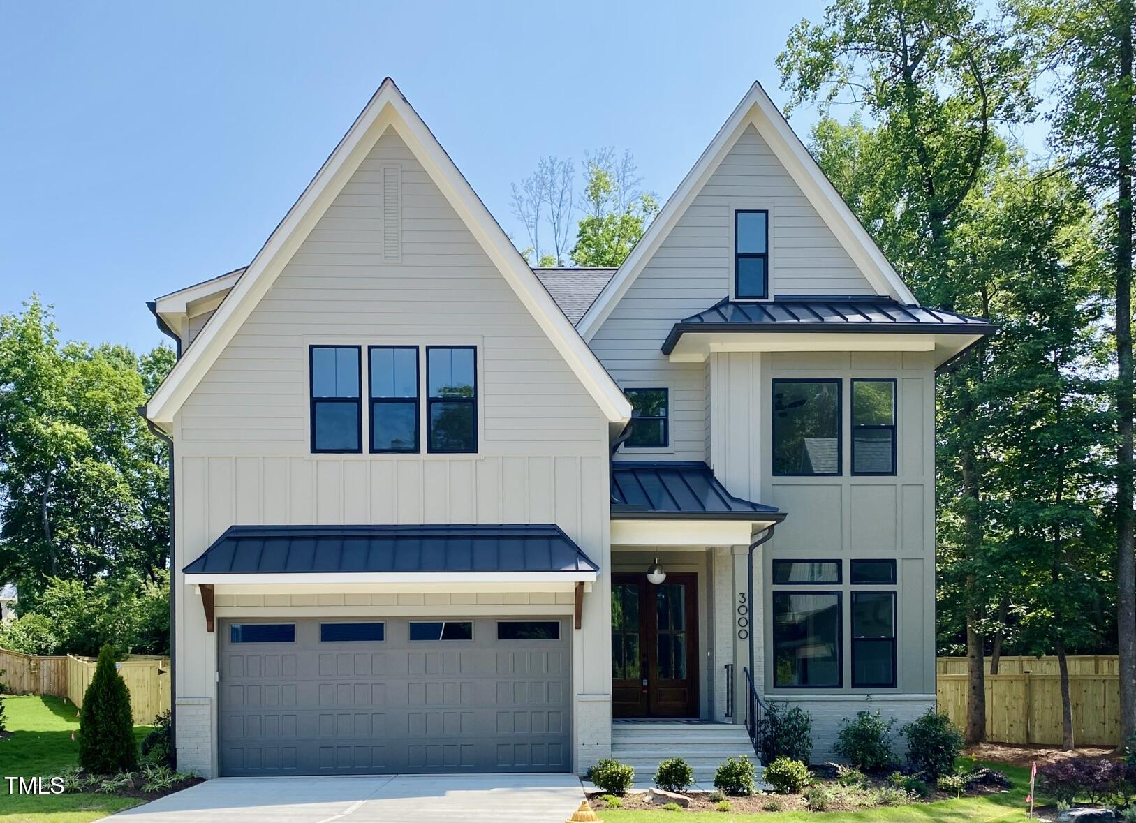 3000 Eden Harbor Court Raleigh, NC 27613 - Photo 1 of 27 a front view of a house with plants