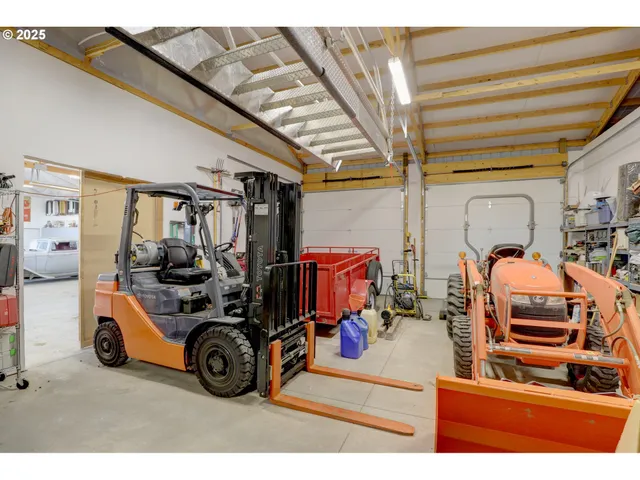 a view of parking garage with cars