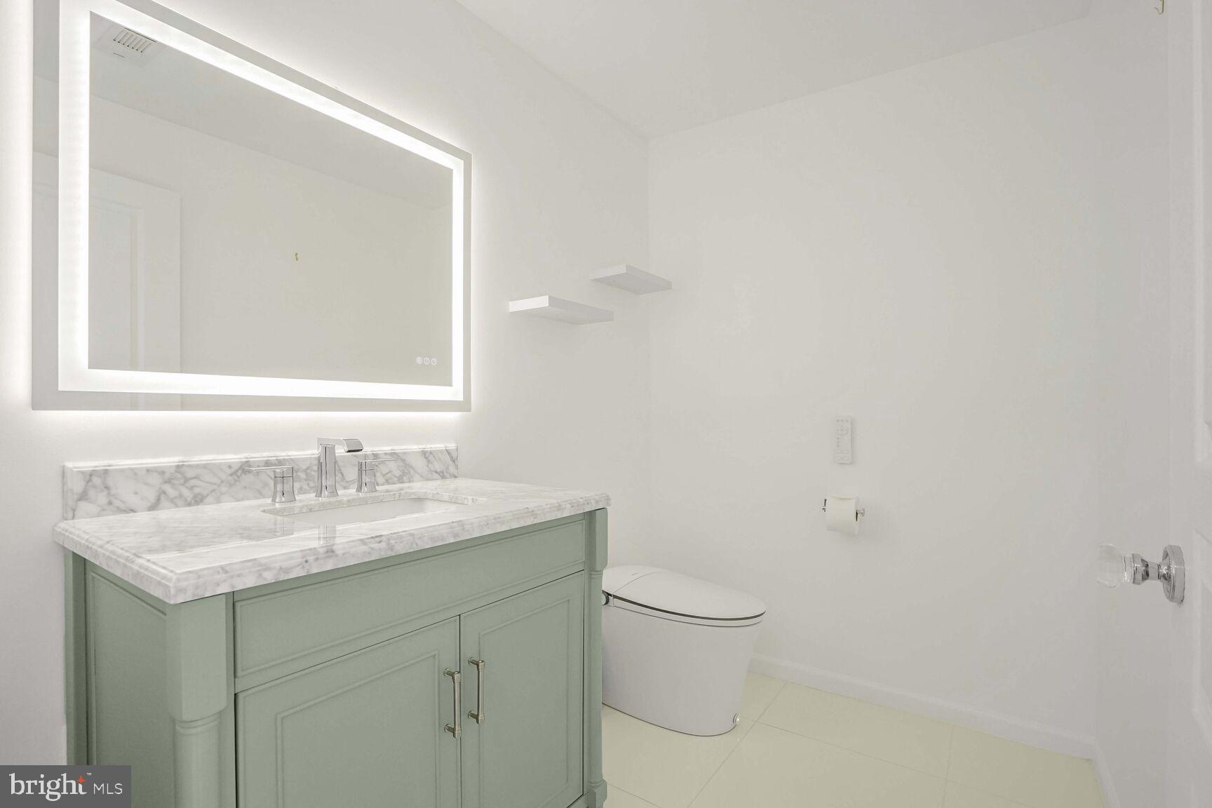 12000 Market Street, Unit 421 Reston, VA 20190 - Photo 12 of 64 Powder Bathroom