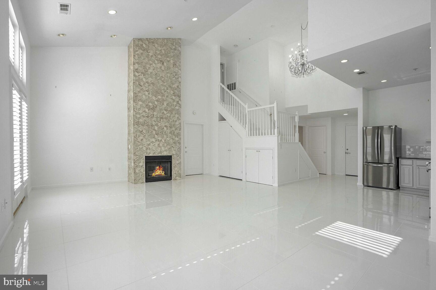 12000 Market Street, Unit 421 Reston, VA 20190 - Photo 18 of 64 Custom Stone Fireplace