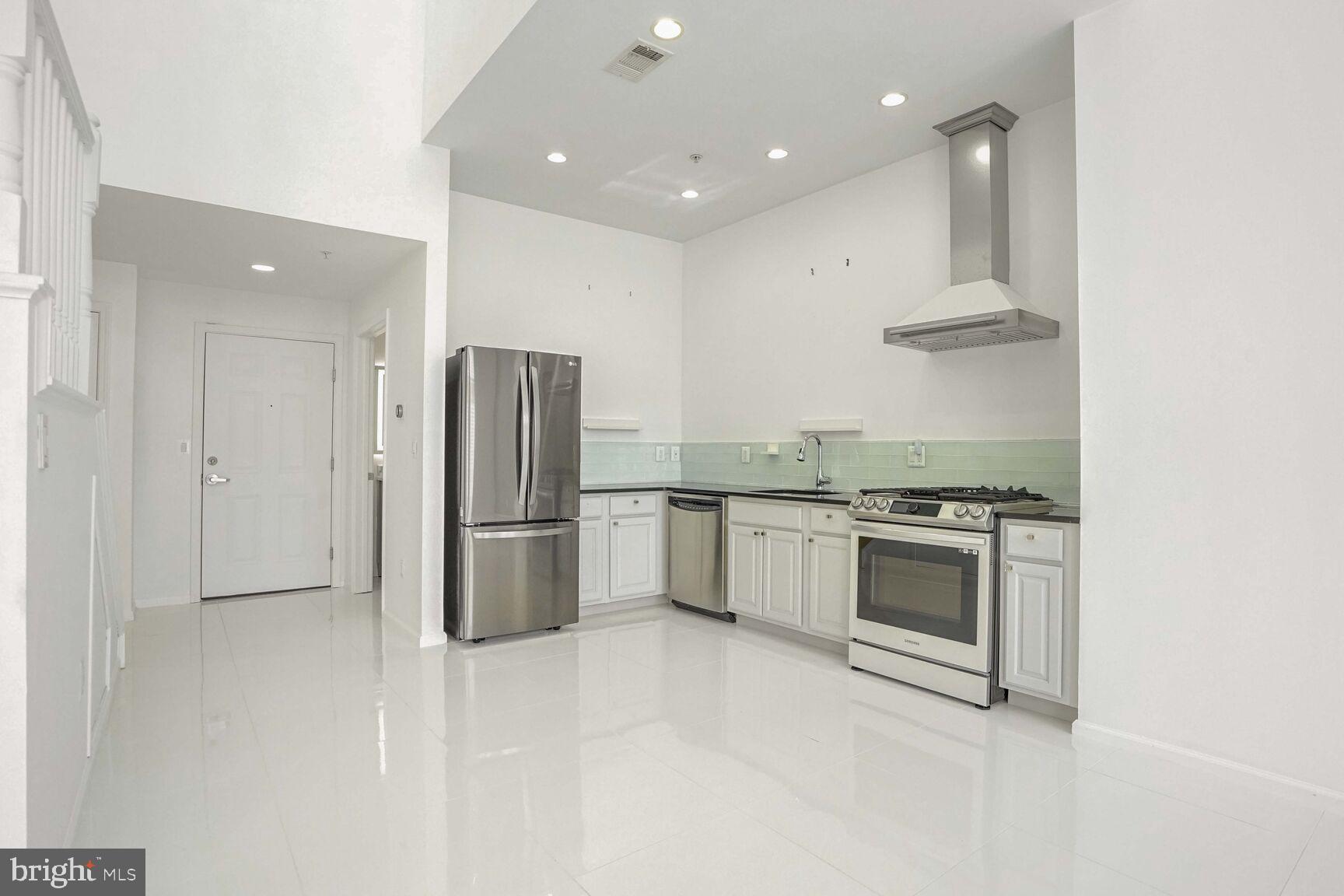 12000 Market Street, Unit 421 Reston, VA 20190 - Photo 21 of 64 Multiple Kitchen Views