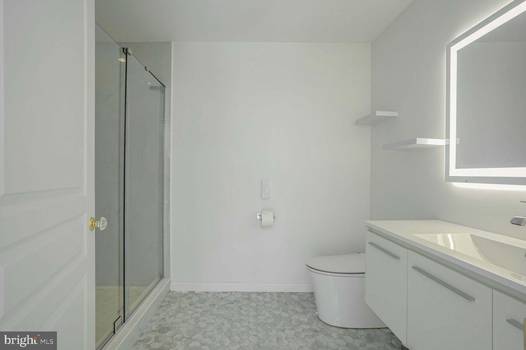 12000 Market Street, Unit 421 Reston, VA 20190 - Photo 29 of 64 Fully Updated Bathroom, with automated toilet.