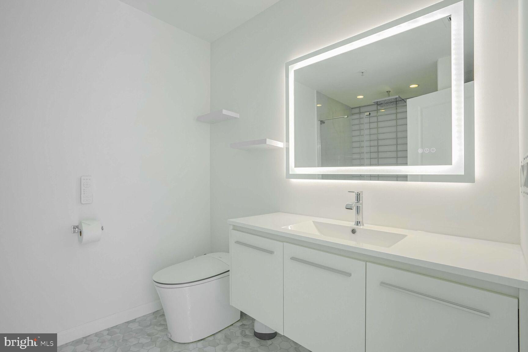 12000 Market Street, Unit 421 Reston, VA 20190 - Photo 30 of 64 Enhanced Vanity Bathroom .