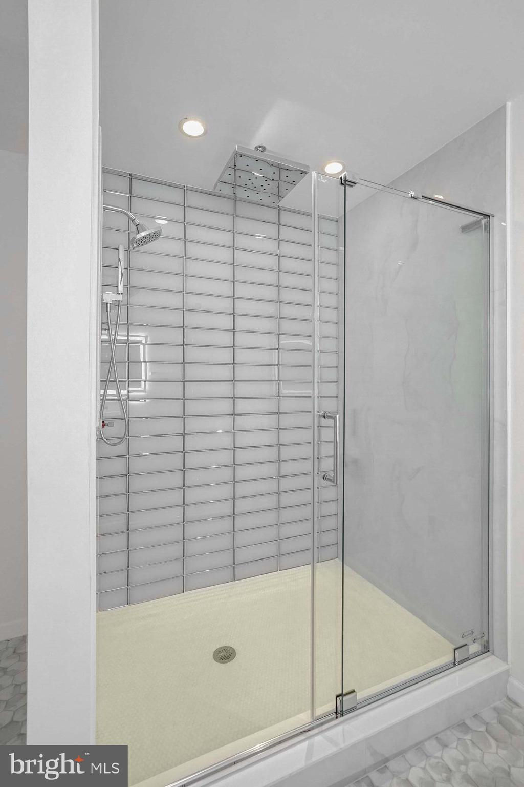 12000 Market Street, Unit 421 Reston, VA 20190 - Photo 32 of 64 Beautifully Tiled Owners Walk in Shower