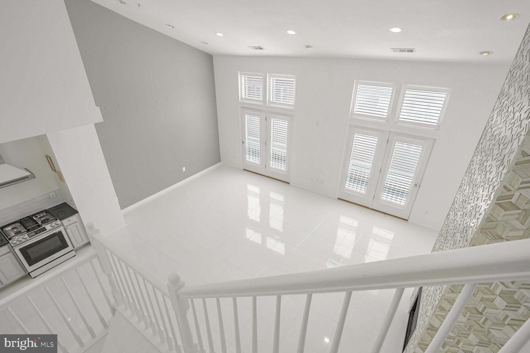 12000 Market Street, Unit 421 Reston, VA 20190 - Photo 34 of 64 A look from the top of the stairs.