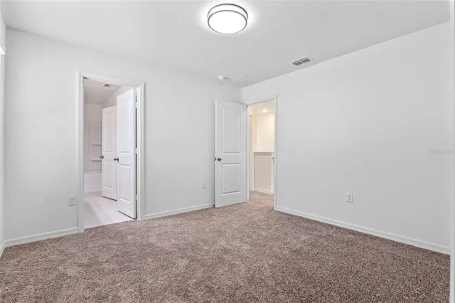 an empty room with an entryway