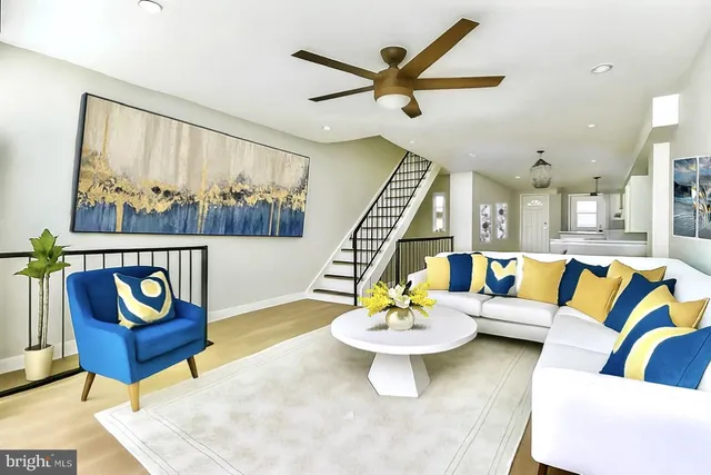 a living room with furniture and a rug