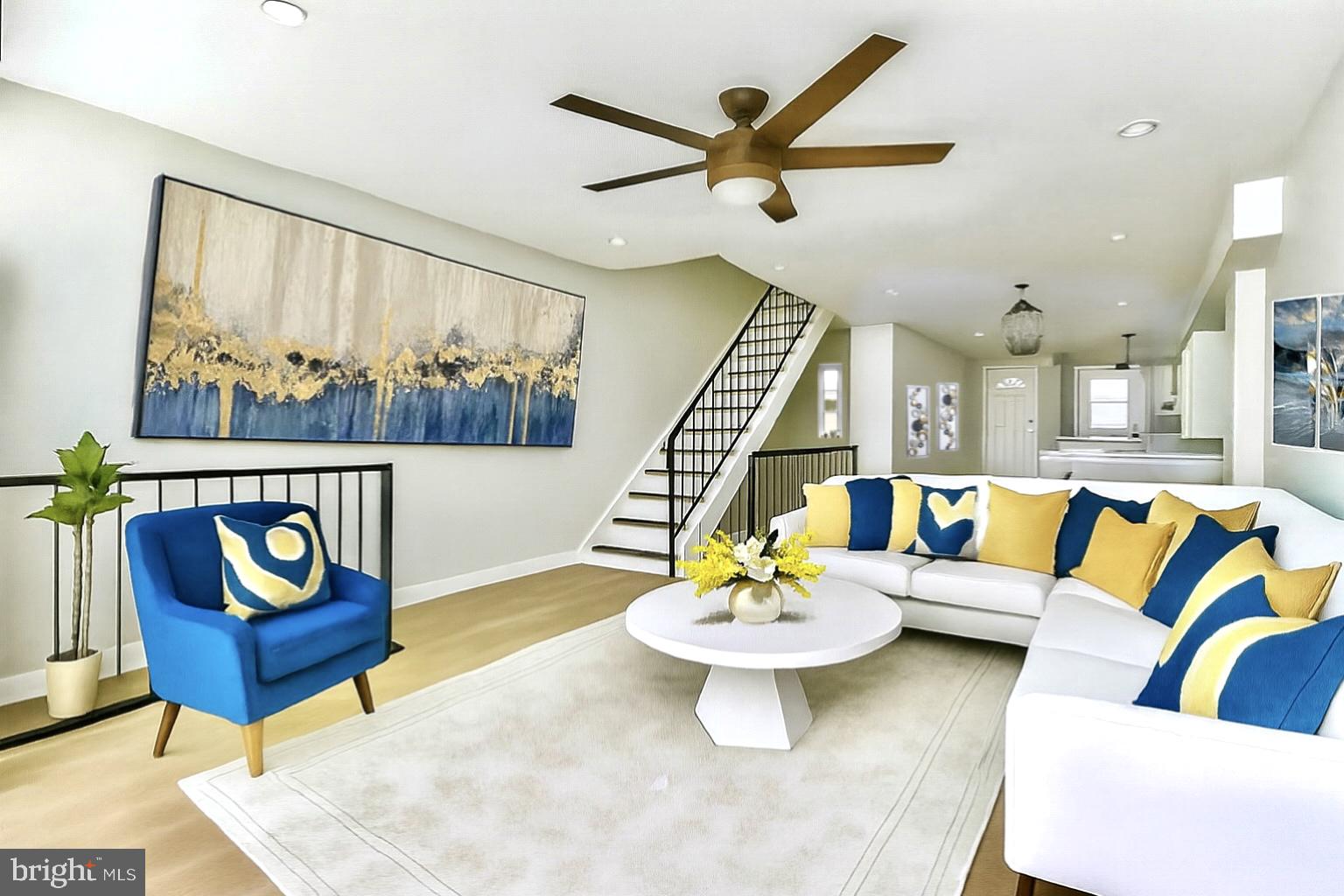 624 North Payson Street Baltimore, MD 21217 - Photo 1 of 8 a living room with furniture and a rug