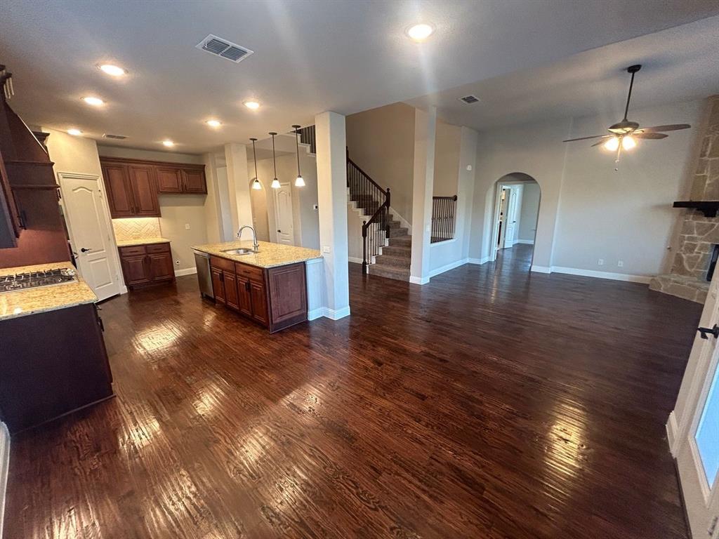 2003 Cheshire Way Forney, TX 75126 - Photo 11 of 35 a lobby with furniture and wooden floor