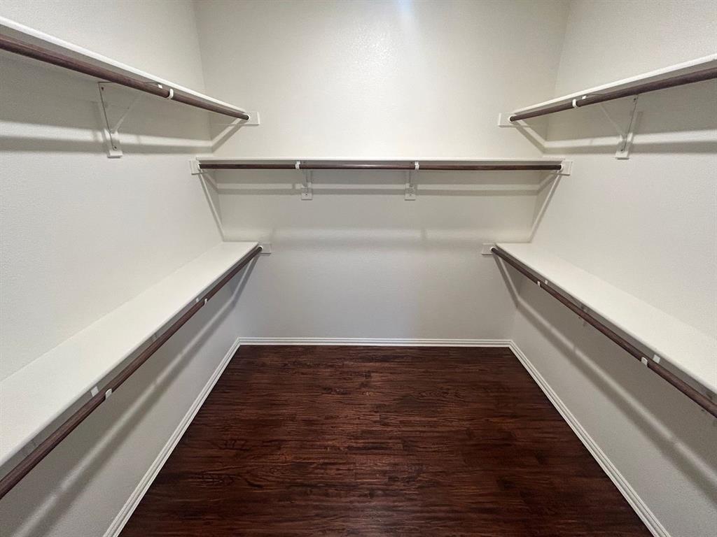 2003 Cheshire Way Forney, TX 75126 - Photo 19 of 35 a view of an empty walk in closet