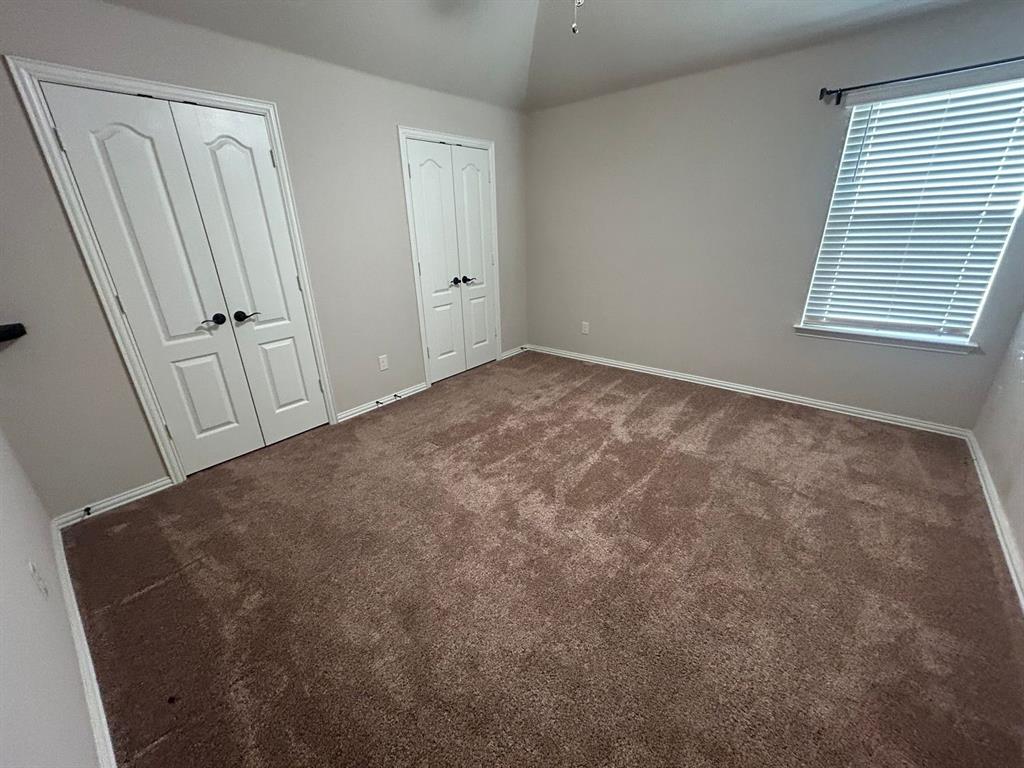 2003 Cheshire Way Forney, TX 75126 - Photo 25 of 35 an empty room with windows