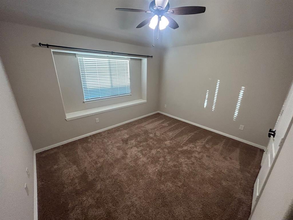 2003 Cheshire Way Forney, TX 75126 - Photo 28 of 35 a view of an empty room with a window