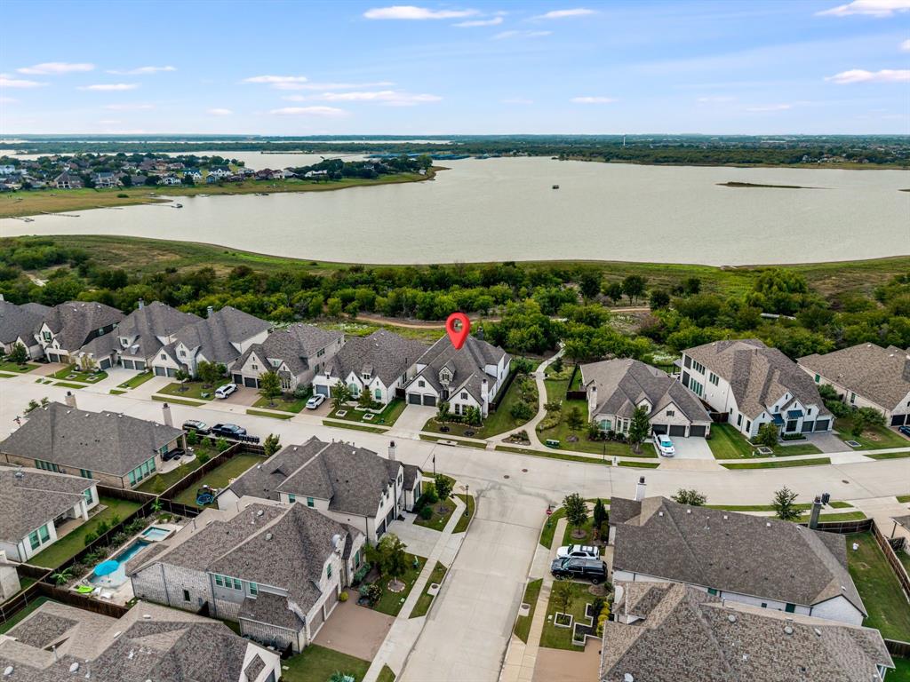 8288 Western The Colony, TX 75056 - Photo 34 of 40 a view of lake and houses with outdoor space