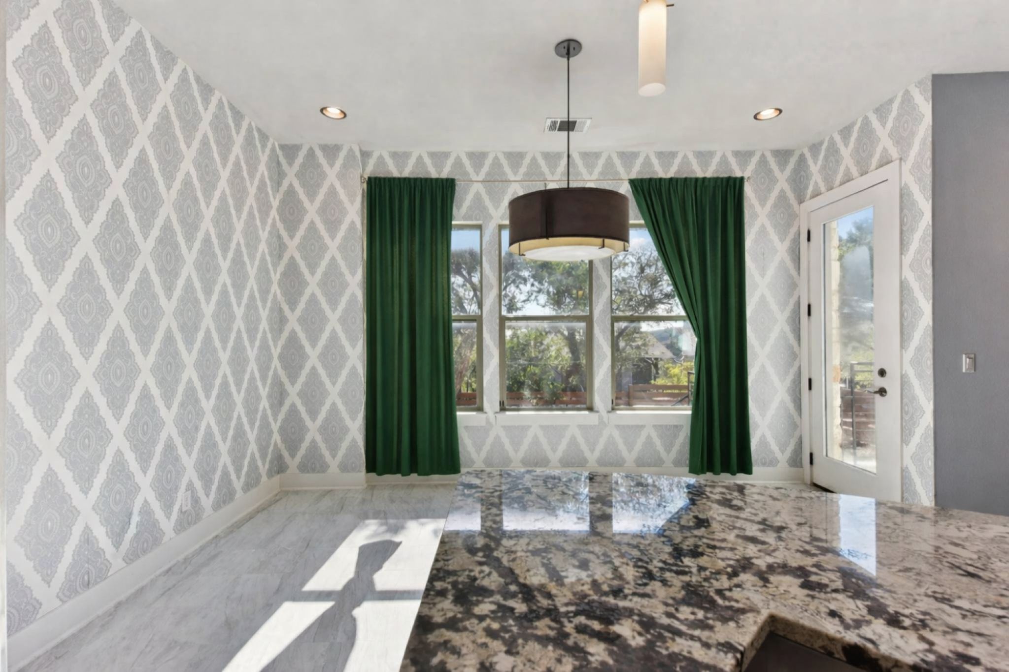 8110 Ranch Road 2222, Unit 98 Austin, TX 78730 - Photo 12 of 37 Dining area featuring wallpapered walls and recessed lighting