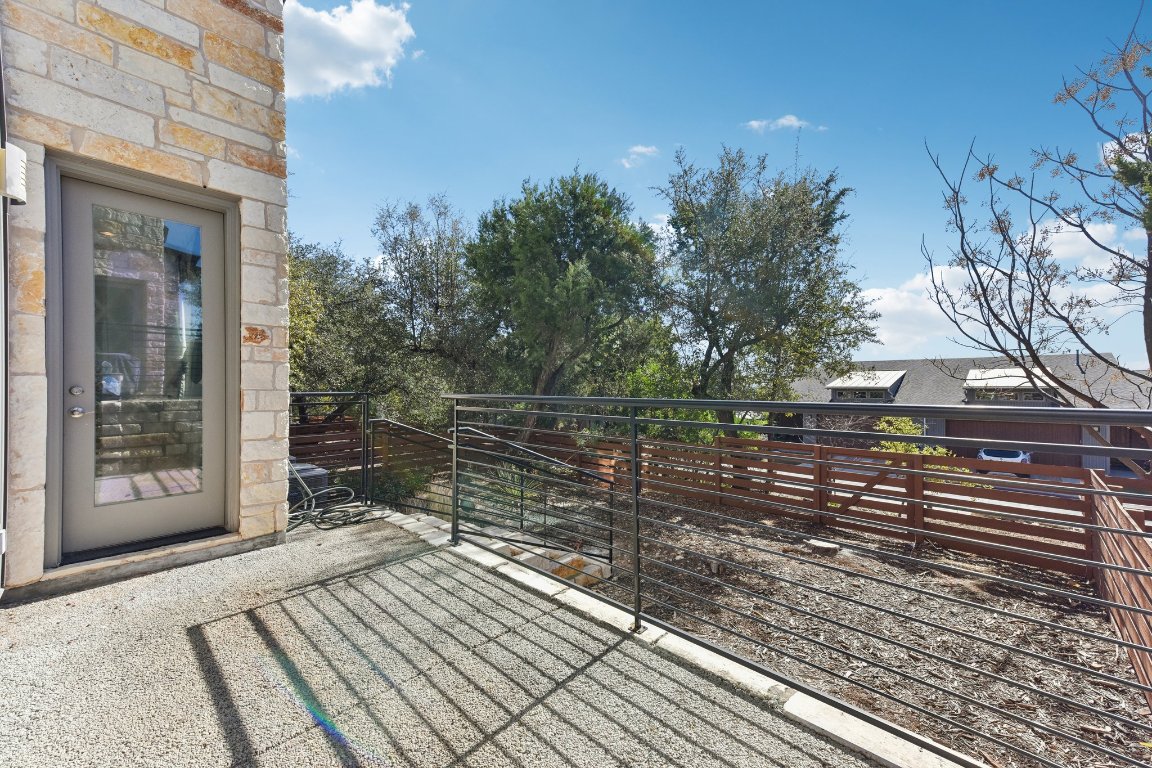 8110 Ranch Road 2222, Unit 98 Austin, TX 78730 - Photo 31 of 37 Wooden deck featuring a patio