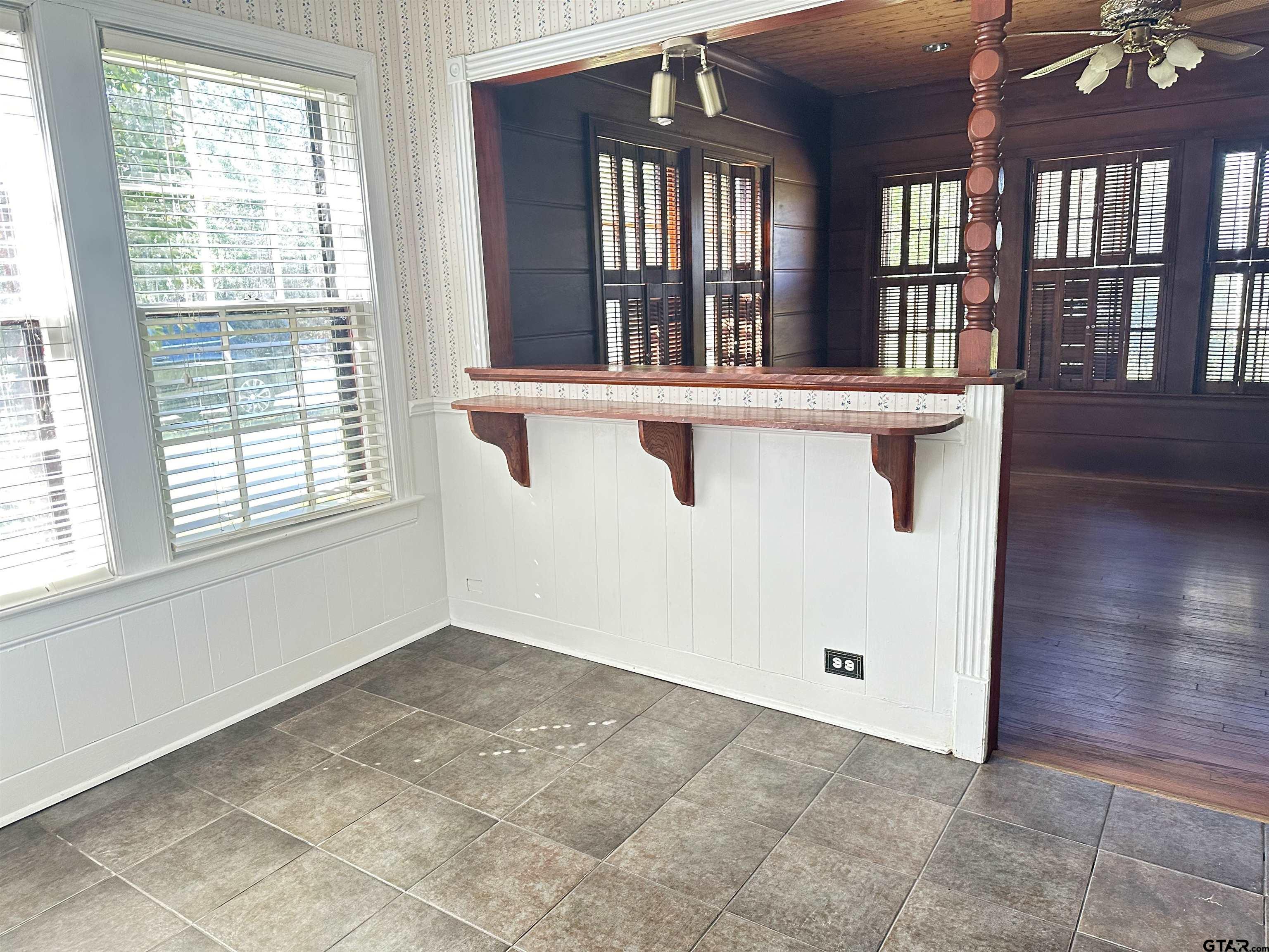 2337 East Rusk Street Jacksonville, TX 75766 - Photo 14 of 47 a view of a room with large windows
