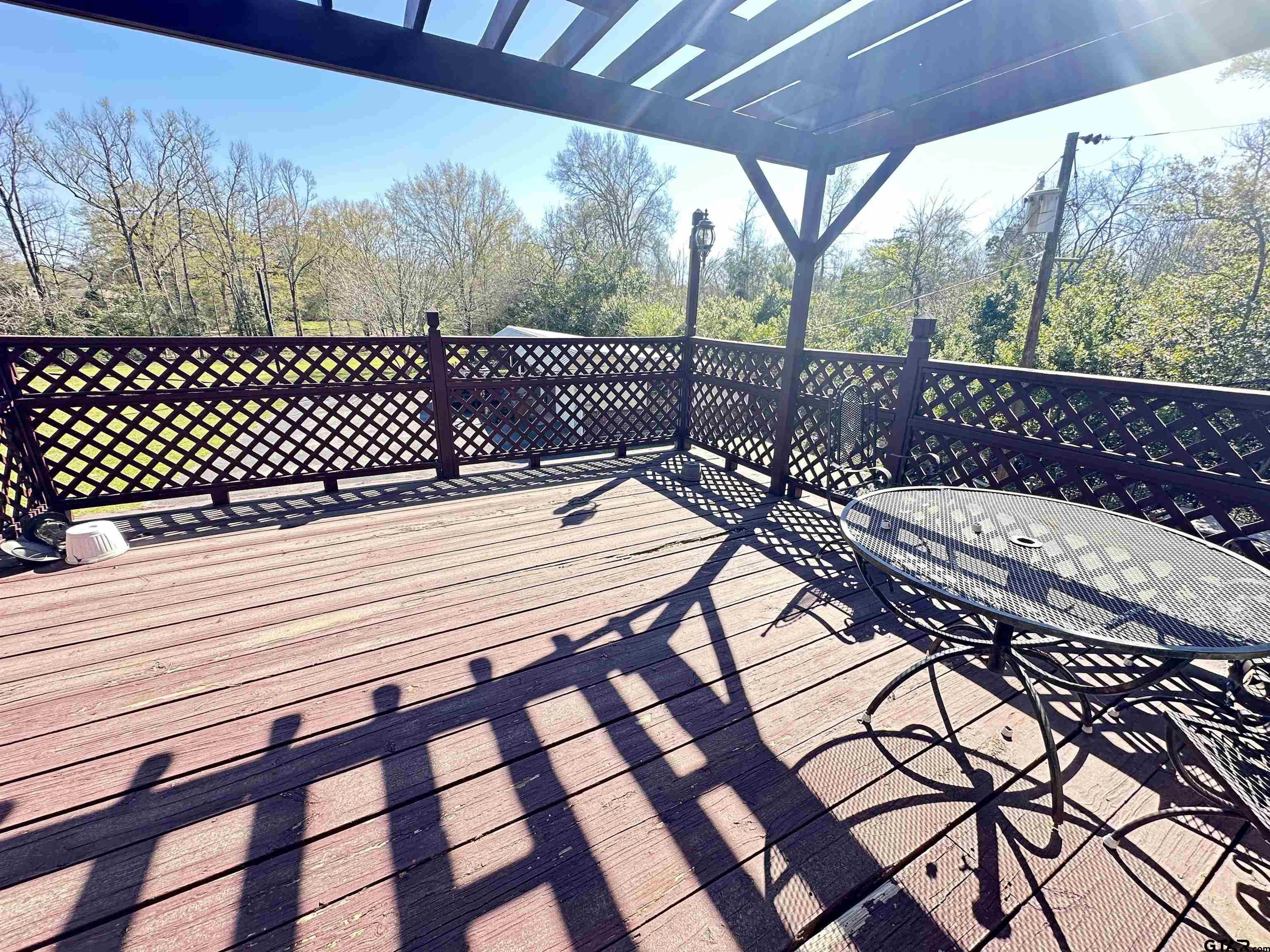 2337 East Rusk Street Jacksonville, TX 75766 - Photo 47 of 47 a view of a bench in the roof