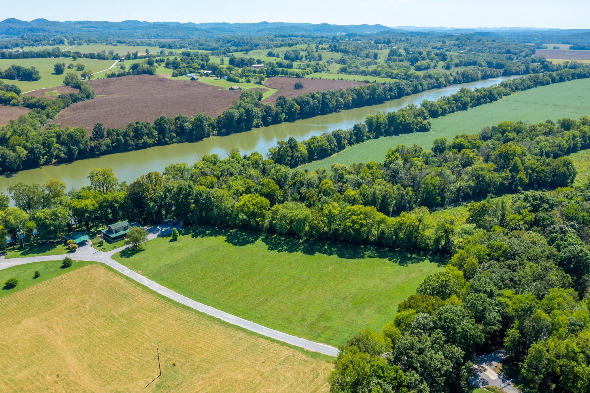 546 Hiwassee Road Lebanon, TN 37087 - Photo 14 of 67 an aerial view of a house with a yard and lake view