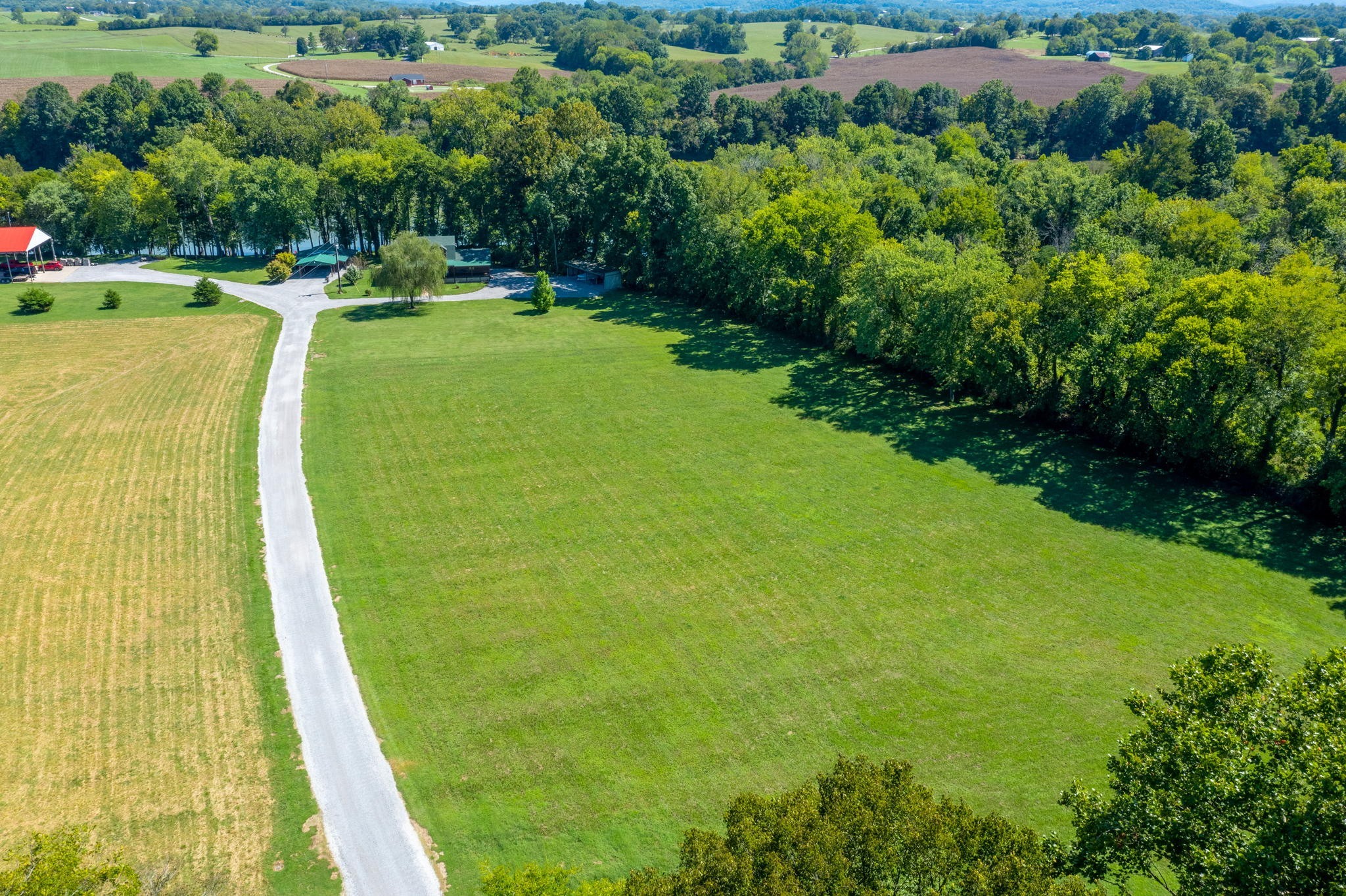 546 Hiwassee Road Lebanon, TN 37087 - Photo 15 of 67 a view of a swimming pool with a garden