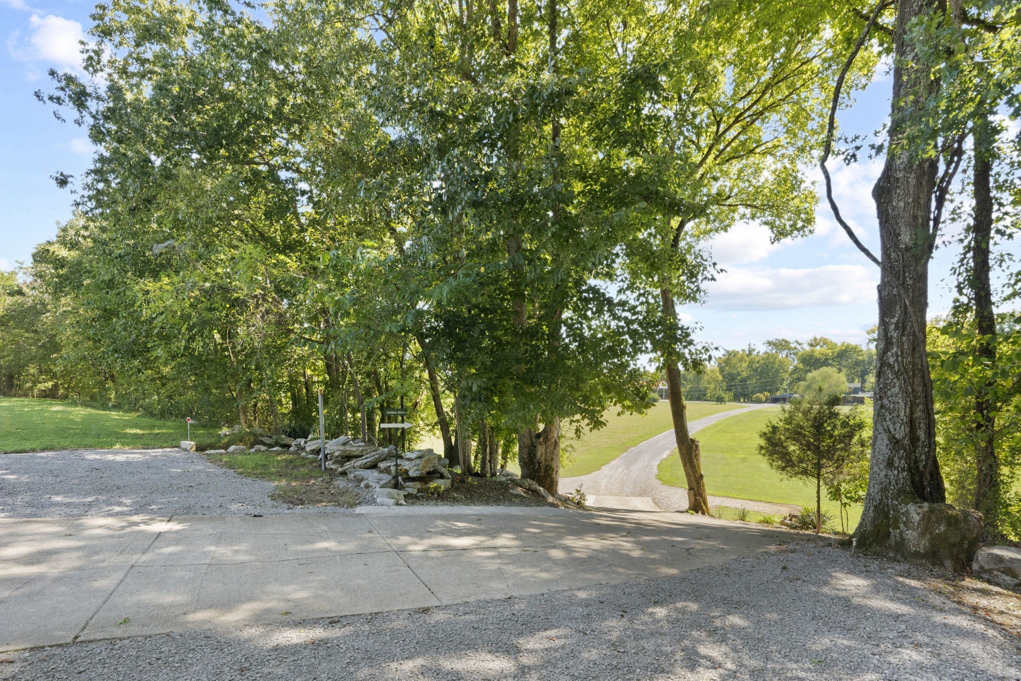 546 Hiwassee Road Lebanon, TN 37087 - Photo 19 of 67 a view of a yard with plants and trees