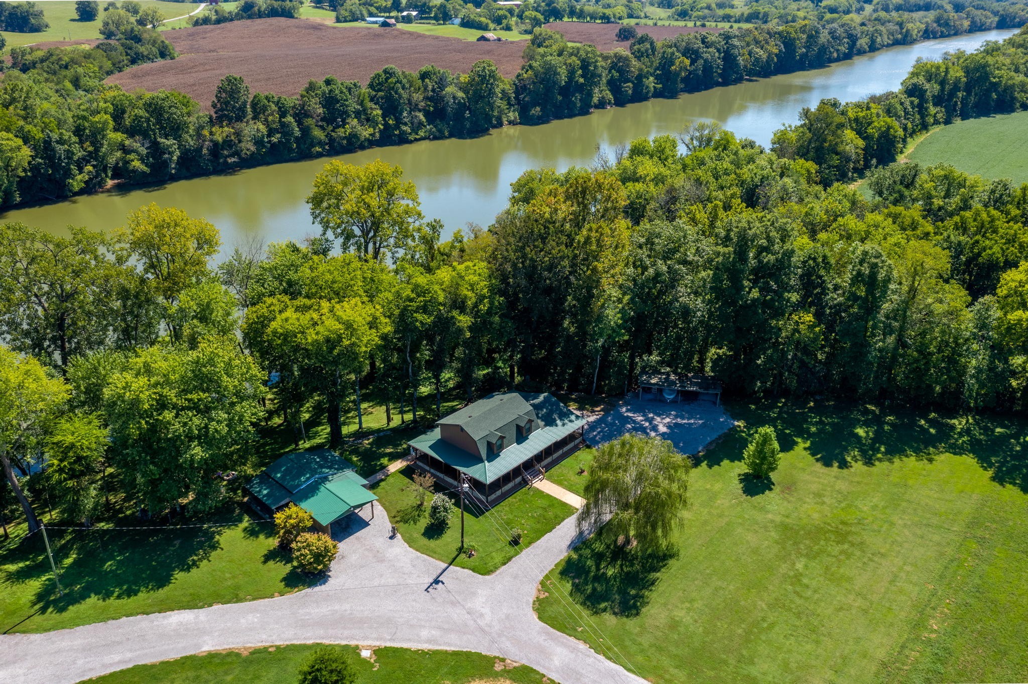 546 Hiwassee Road Lebanon, TN 37087 - Photo 2 of 67 an aerial view of a house with a garden and swimming pool
