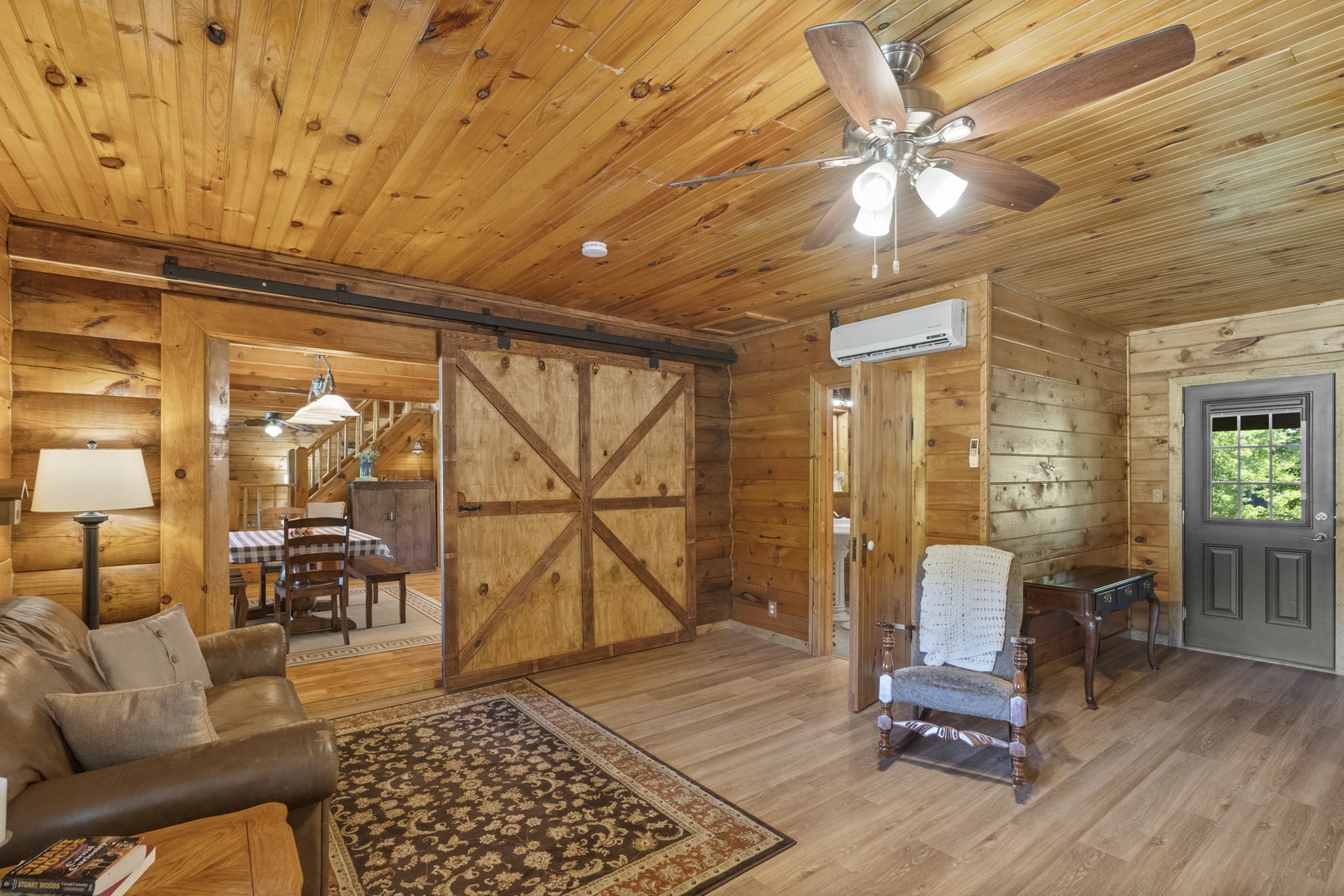 546 Hiwassee Road Lebanon, TN 37087 - Photo 34 of 67 a living room with patio furniture and a floor to ceiling window